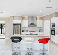 Central Gold Coast Large Modern Elevated Home - Accommodation Kalgoorlie